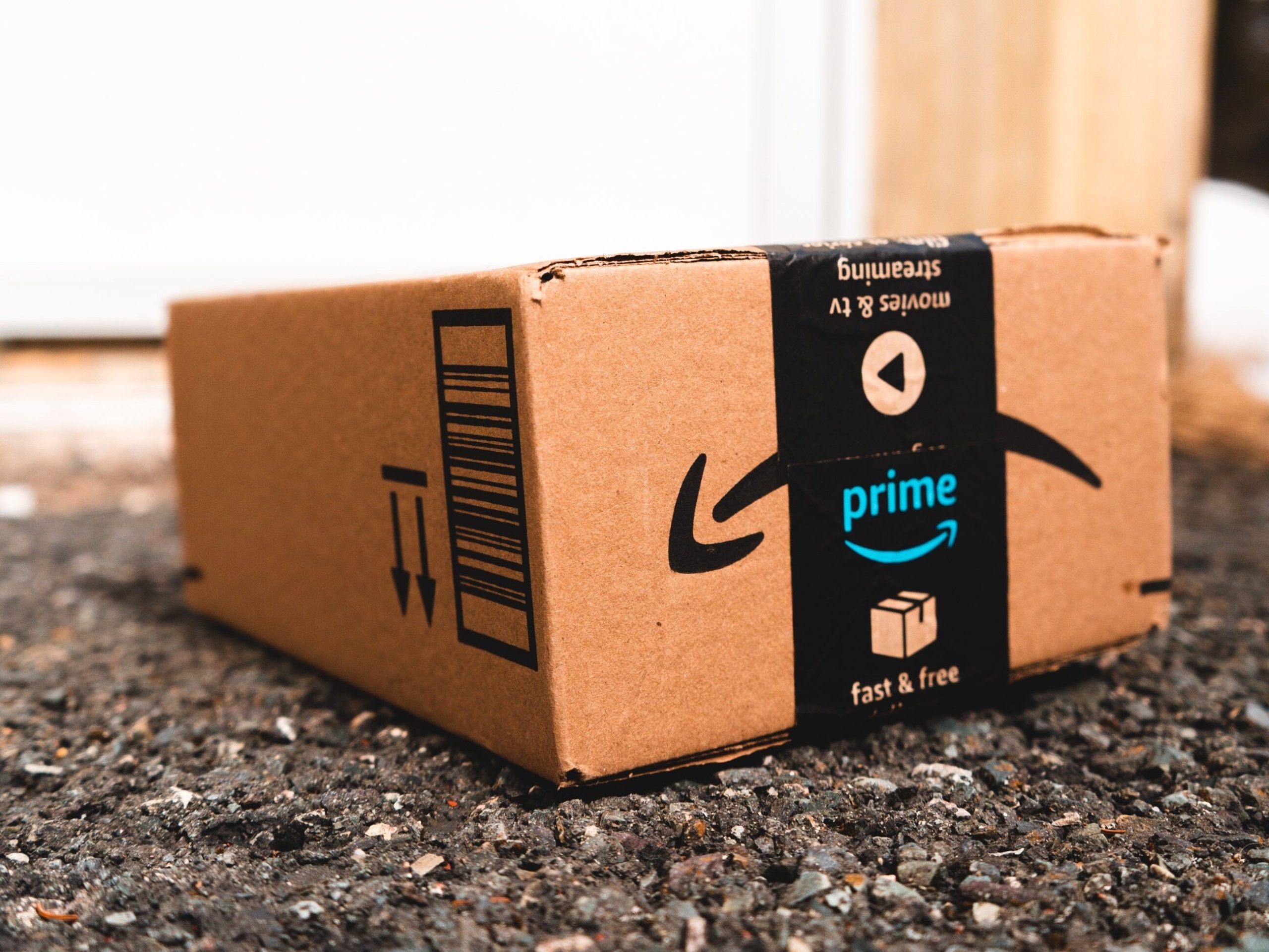 A woman receives packages from Amazon every day.  She didn't order one
