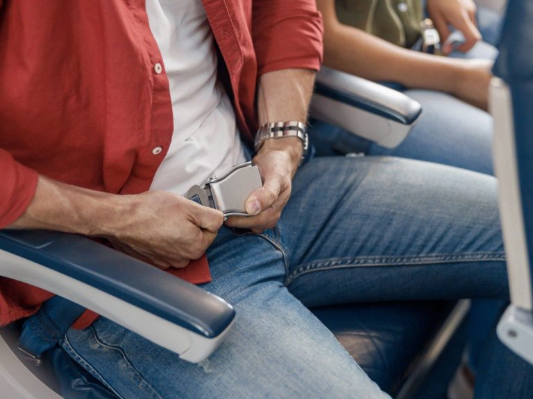 A dangerous trick popular on TikTok.  Passengers fasten their seat belts around their ankles on the plane